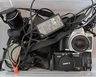 Box Of Cameras And Other Electronics