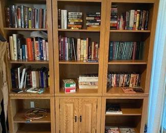 wooden bookcase, books, DVD's