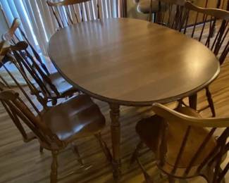 kitchen table with 4 chairs and one leaf