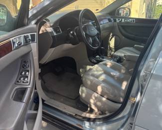 2006 Chrysler Pacifica, 121,500k miles, does not currently run (probably old gas, starts with starter fluid), back door does not open all the way. $2,000 OBO, see VIN photo