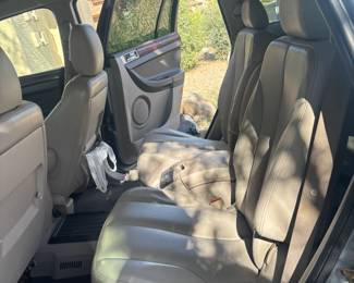 2006 Chrysler Pacifica, 121,500k miles, does not currently run (probably old gas, starts with starter fluid), back door does not open all the way. $2,000 OBO, see VIN photo
