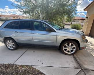 2006 Chrysler Pacifica, 121,500k miles, does not currently run (probably old gas, starts with starter fluid), back door does not open all the way. $2,000 OBO, see VIN photo