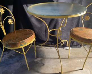 Yellow Metal Glasstop Bistro Table And Matching Metal Chairs 