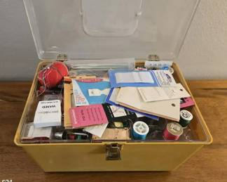 Sewing supplies in tackle box