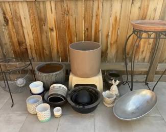 Collection of Ceramic Planters, Metal Stands, and Garden Decor