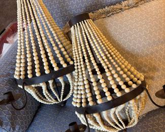 Pair of Cream Beaded Wall Sconces with Dark Metal Frame