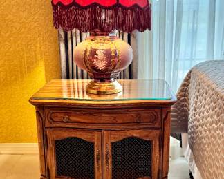 French provencial with mesh door beside chest, one of pair