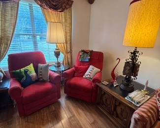 Matching red armchairs, swivel and rock 