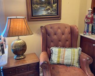 Nice recliner, side table, wall art