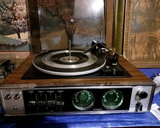 Needs repair. Turntable doesn't spin. Radio works.