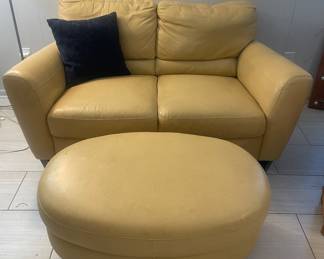Leather loveseat w/ottoman 
just a few imperfections 