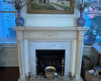 One of the many fireplaces with Fender and Andirons