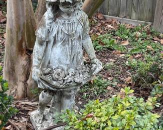 A little girl in the garden