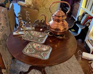 beautiful table with copper and rose medallion