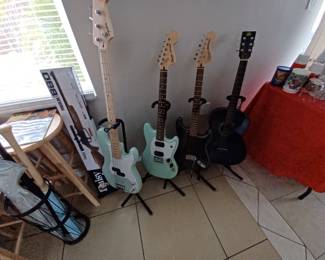 Electric Guitars, 1 regular Guitar all with Stands
