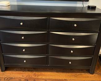 69. 8 Drawer Black Dresser (59" x 17" x 40")