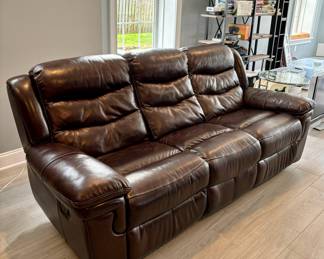 78. Brown Leather Recliner Sofa (88" x 35" x 38")
