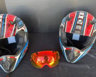 Two Helmets And A Pair Of Goggles