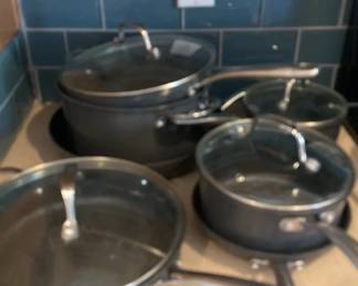 Seven Piece Set Of Granite Stone, Diamond Pots, And Pans With Lids