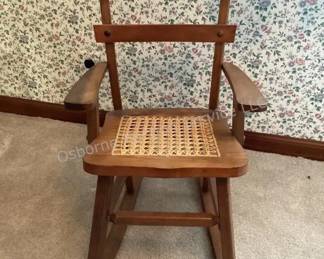 Child's wood rocker with cane seat