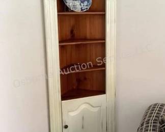 Distressed corner cabinet