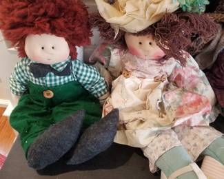 "Little Souls" rag dolls - one-of-a-kind, collectible dolls designed and handmade by artist Gretchen Wilson. 
Each doll is handcrafted and personally signed by the artist. Known for their whimsical, individual personalities and use of recycled materials for accessories. 