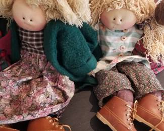 "Little Souls" rag dolls - one-of-a-kind, collectible dolls designed and handmade by artist Gretchen Wilson. 
Each doll is handcrafted and personally signed by the artist. Known for their whimsical, individual personalities and use of recycled materials for accessories. 