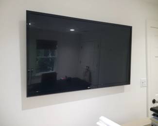 TV with mounting bracket