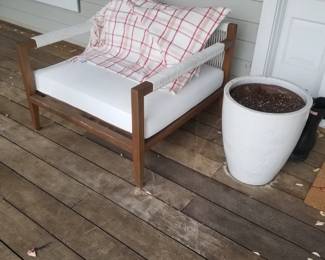 Teak porch chair; large ceramic pot