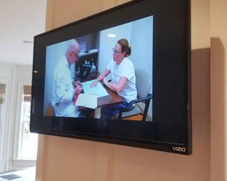 TV with mounting bracket