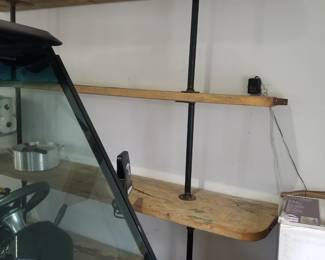 Reclaimed plank shelving on pipe