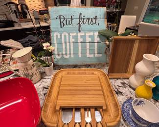 Wood cheese and cracker board with self storing spreaders