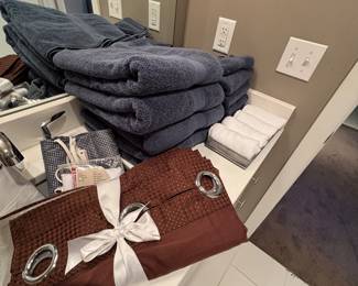 Shower curtains, liners and Pottery Barn towels