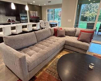 McNabb & Risley sectional two piece with loose back cushions.  Additional set of seat cushions that are not tufted button included.