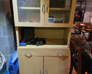 Vintage metal medical office cabinet or kitchen pantry. Super cool!