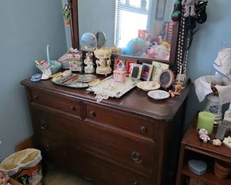 Antique wooden dresser with mirror.