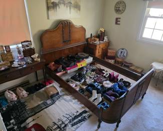 Gorgeous antique wooden bed frame, matches other antique Furniture item in home.