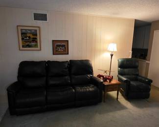 Black leather power reclining sofa