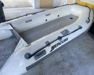 2005 Mercury inflatable with pump, paddles, light, etc. Made of hypalon (more durable than CSM). Ten feet long, rated for up to 15 hp. No tears or rips. Holding air like a champ.