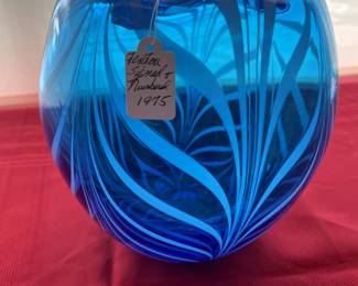signed fenton, 1975, 9" high, blue with white feathers
