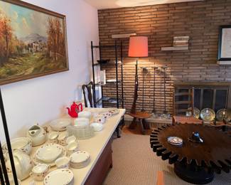 Hall China; tin plates; oil painting; vintage ashtray; rifle lamp; cog table (sold); three hanging pendant lights; books; framed map; etc