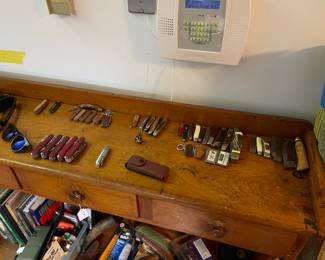 Pocket knives and gun items; not shown are fishing lures and fishing poles