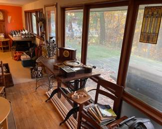 Martha Stewart Magazines and books; vintage life vests; 1880's glass bottles; camping items; antique, hand made 6'7" grandfather clock; antique and vintage clocks; travel books; vintage and new suit cases; Frank Lloyd Wrights window replica; white curtain rods; etc.