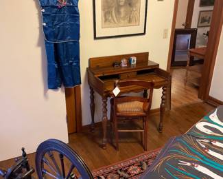 Oriental outfit; pencil drawing; antique Spinning wheel; small vintage desk with canned chair; antique ironing board, vintage quilted blanket; Heriz Persian rug 5'5" x 8'5". 