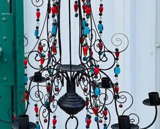 Glass bead and metal chandelier for candles. Great patio decoration. 