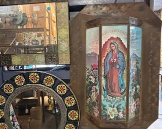 Assorted mirrors and wall sconces from Mexico.