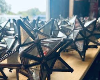 Mirror stars for tealights. A little weather worn but very loved.
