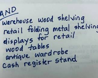Warehouse wood shelving, folding iron metal retail shelving from the Container store, wood display tables, Ikea display tables, antique wardrobe for display/storage, wood register/sales counter.