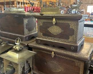 Lots of wood and brass chests in all sizes. 
