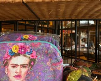 Everybody loves Frida. Cosmetic bags trimmed with sequins and wonderful heart ornaments.